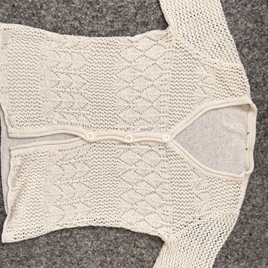 Haut beige en maille boutonné