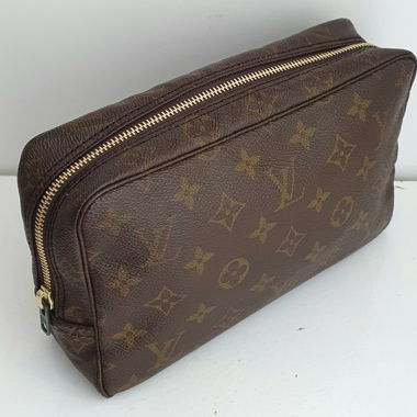 Nécessaire Louis Vuitton PM en toile Monogram