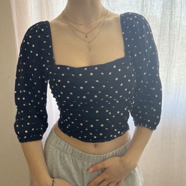 polka dot blouse.