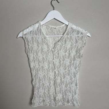 Blouse sans manches en dentelle blanche