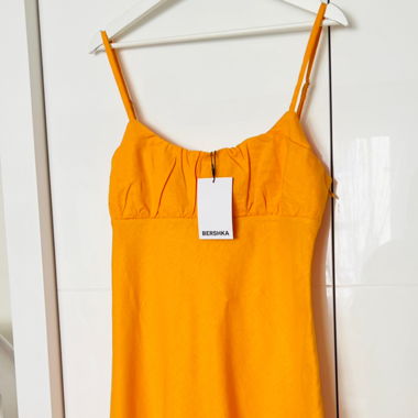 Intense orange dress from Bershka