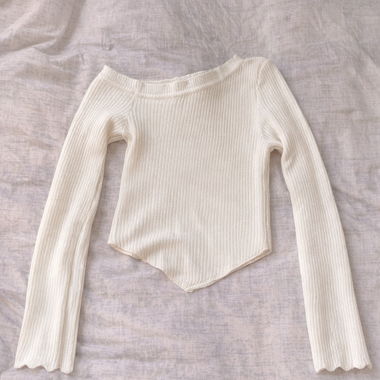 Top bianco a maniche lunghe