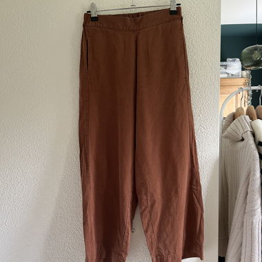 Ochre-brown fabric trousers