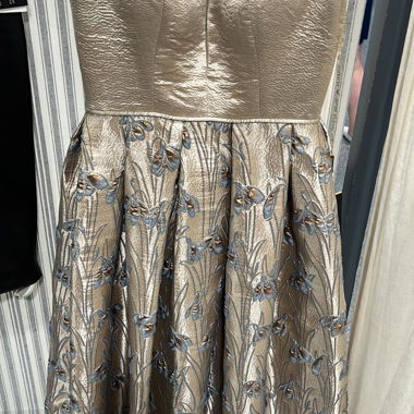 Elegant Gold-Beige Dress with Floral Pattern