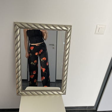 Pantaloni in tessuto a fiori