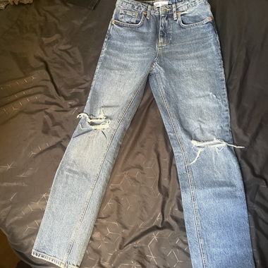 Jeans strappati