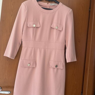 Abito rosa con tasche
