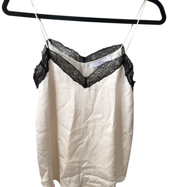 Top in seta bianco con pizzo nero
