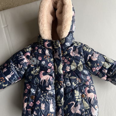 Girl's winter coat with animal motifs