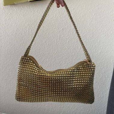 goldene Handtasche