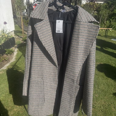 Manteau pour dames à carreaux
