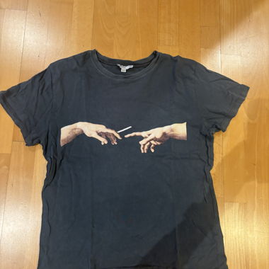 T-shirt noir avec imprimé – One Size (convient pour S) 