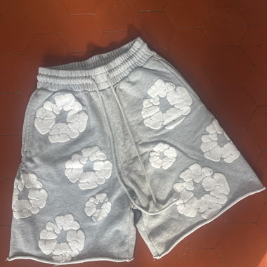 Pantaloncini in sweat Denim Tears con stampa floreale