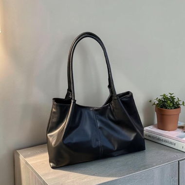 New black shoulder bag, unused
