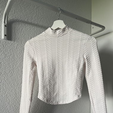 Pull col montant 