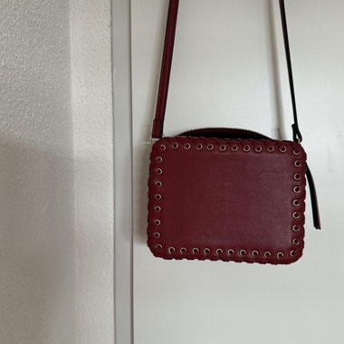 Red crossbody bag with studs