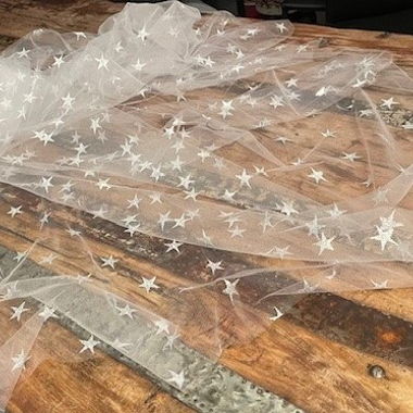 Tulle fabric with silver stars