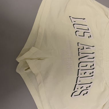Kurze hose, pastel Gelb. Mit aufschrift