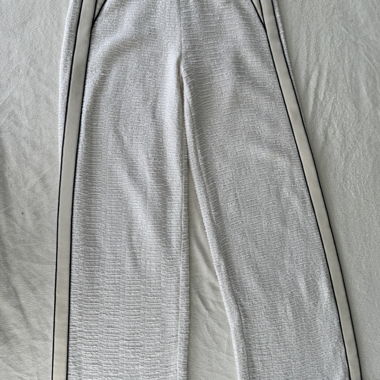 Pantalon en maille à jambes larges Maje