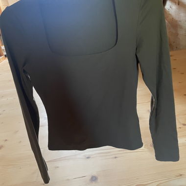 Green long-sleeve shirt