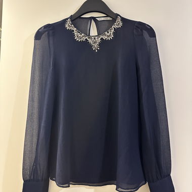 Blusa in chiffon con strass