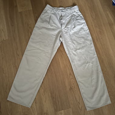 Pantaloni in tessuto beige a vita alta Uniqlo
