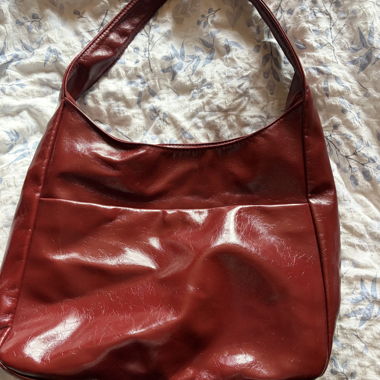 red faux leather bag