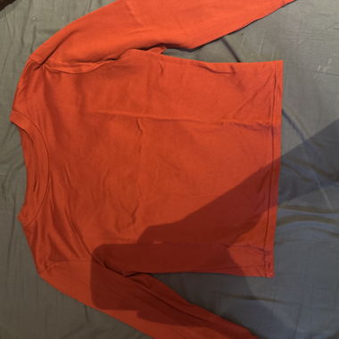 Red long-sleeve shirt
