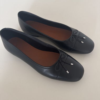 Schwarze Ballerinas