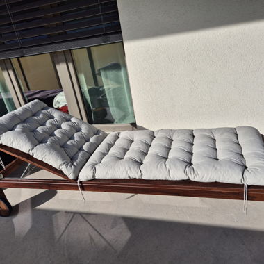 un loungers (2) with cushions and outdoor cover