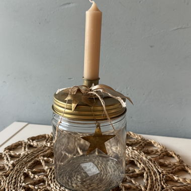 Photophore en verre avec bougie et étoiles