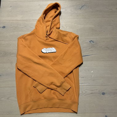Orange sweater with print