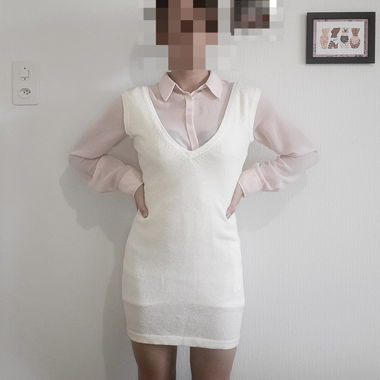 Abito bianco in maglia con paillettes