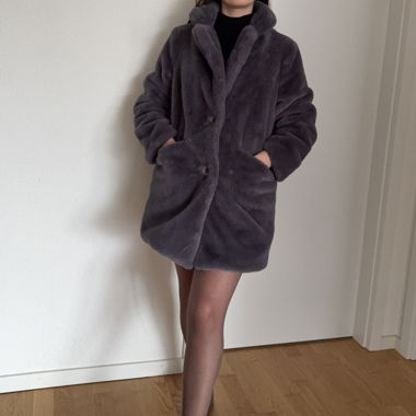 Manteau chaud en fausse fourrure 