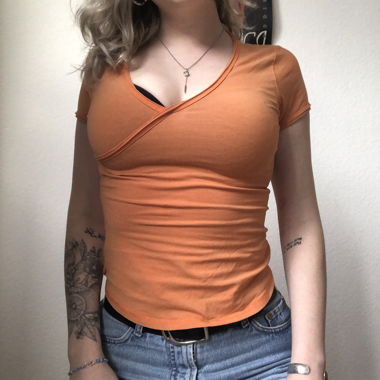 orange shirt with printed back