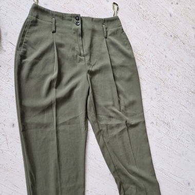 Green business trousers