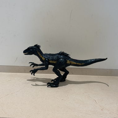 Dinosaurier Spielfigur schwarz-gelb