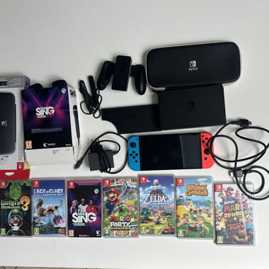 Nintendo Switch OLED pack complet  7 jeux