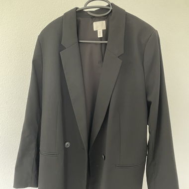 Blazer nero con un bottone