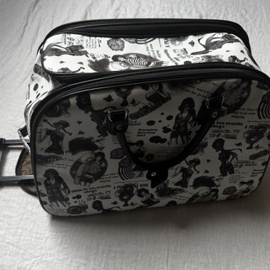 Printed carry-on wheeled suitcase