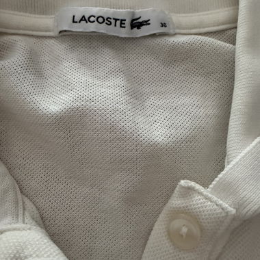 Polo Lacoste bianca