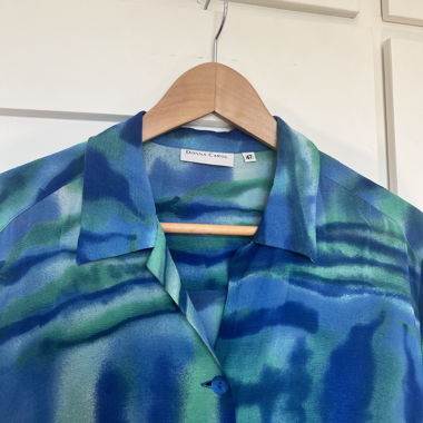 Blusa fluida blu effetto acquerello