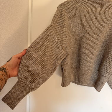 Pull col roulé en maille