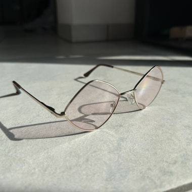 Pink-tinted sunglasses
