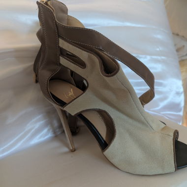Beige high heel sandals with cutouts