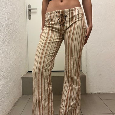 Striped lace-up trousers