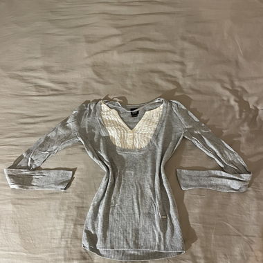Piccolo maglione grigio