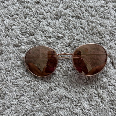 Lunettes de soleil rondes rosé gold