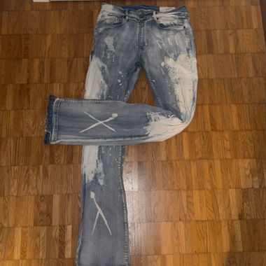 Flared jeans paint splatter