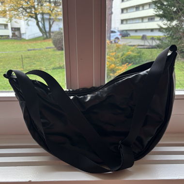 Schwarze Unoqlo-Tasche